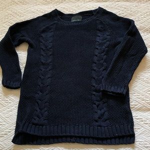 Cable knit sweater with cute styling!